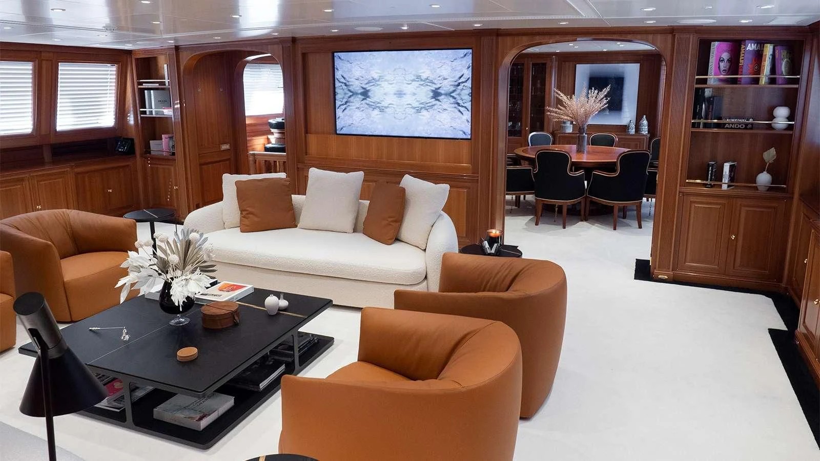 a living room with a couch and a coffee table aboard ALMYRA II Yacht for Charter