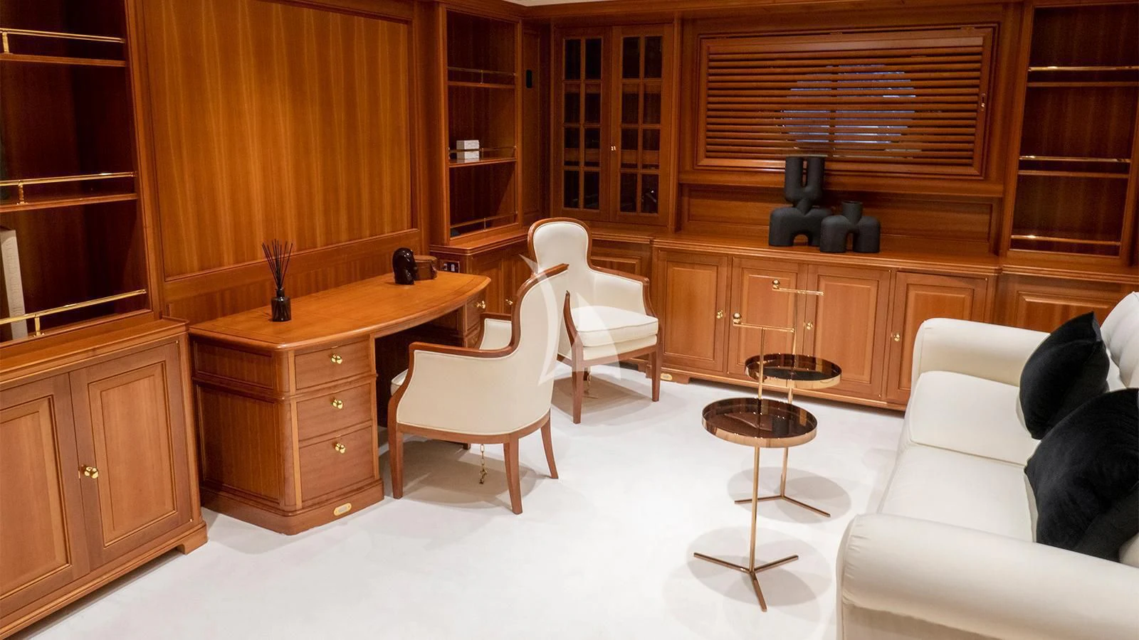 a room with a desk and chairs aboard ALMYRA II Yacht for Charter