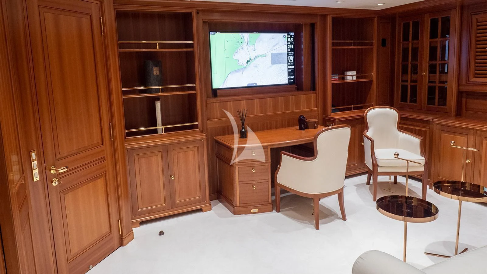 a room with a table and chairs aboard ALMYRA II Yacht for Charter