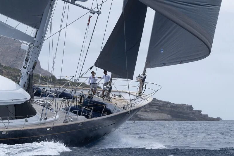 a couple of men on a sailboat aboard ALMYRA II Yacht for Charter