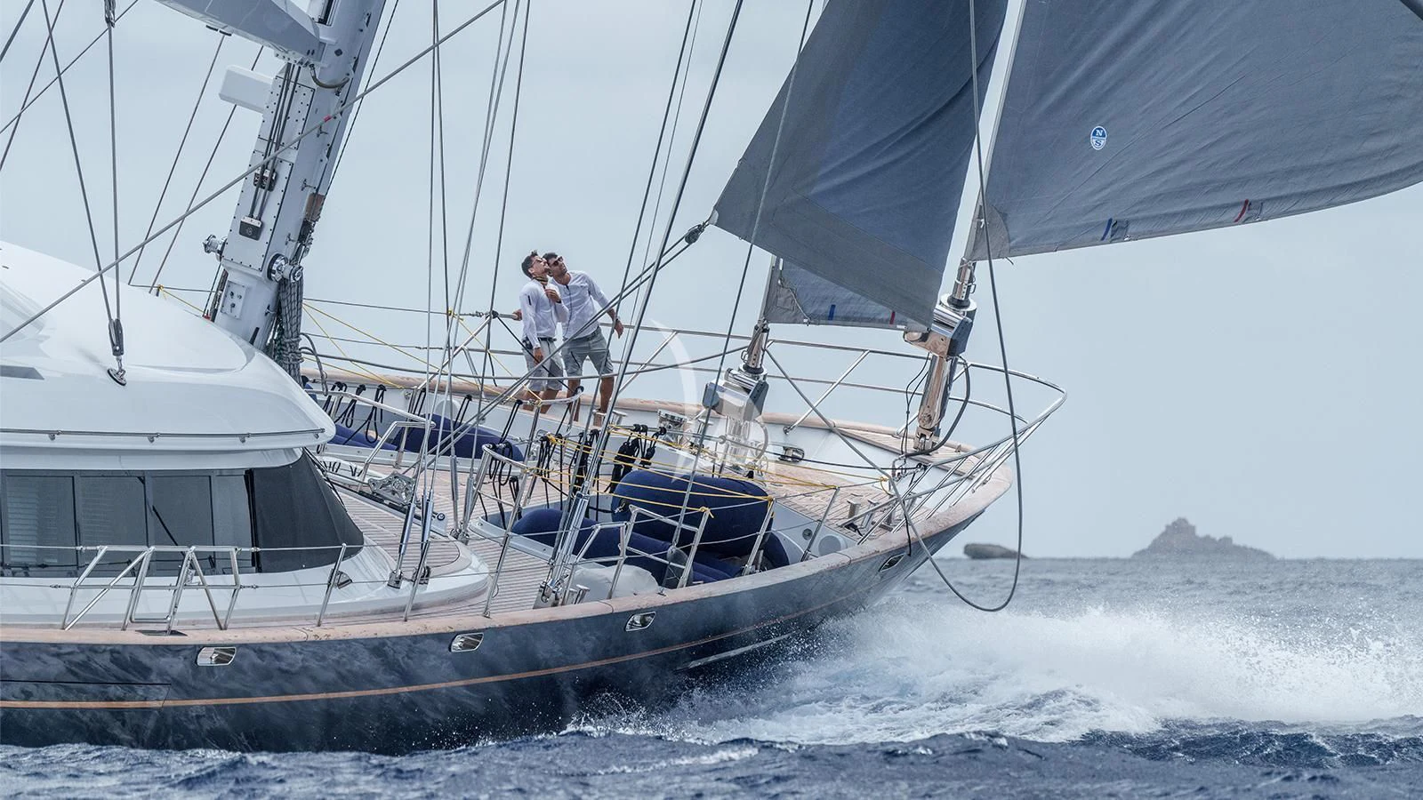 a couple of people on a sailboat aboard ALMYRA II Yacht for Charter