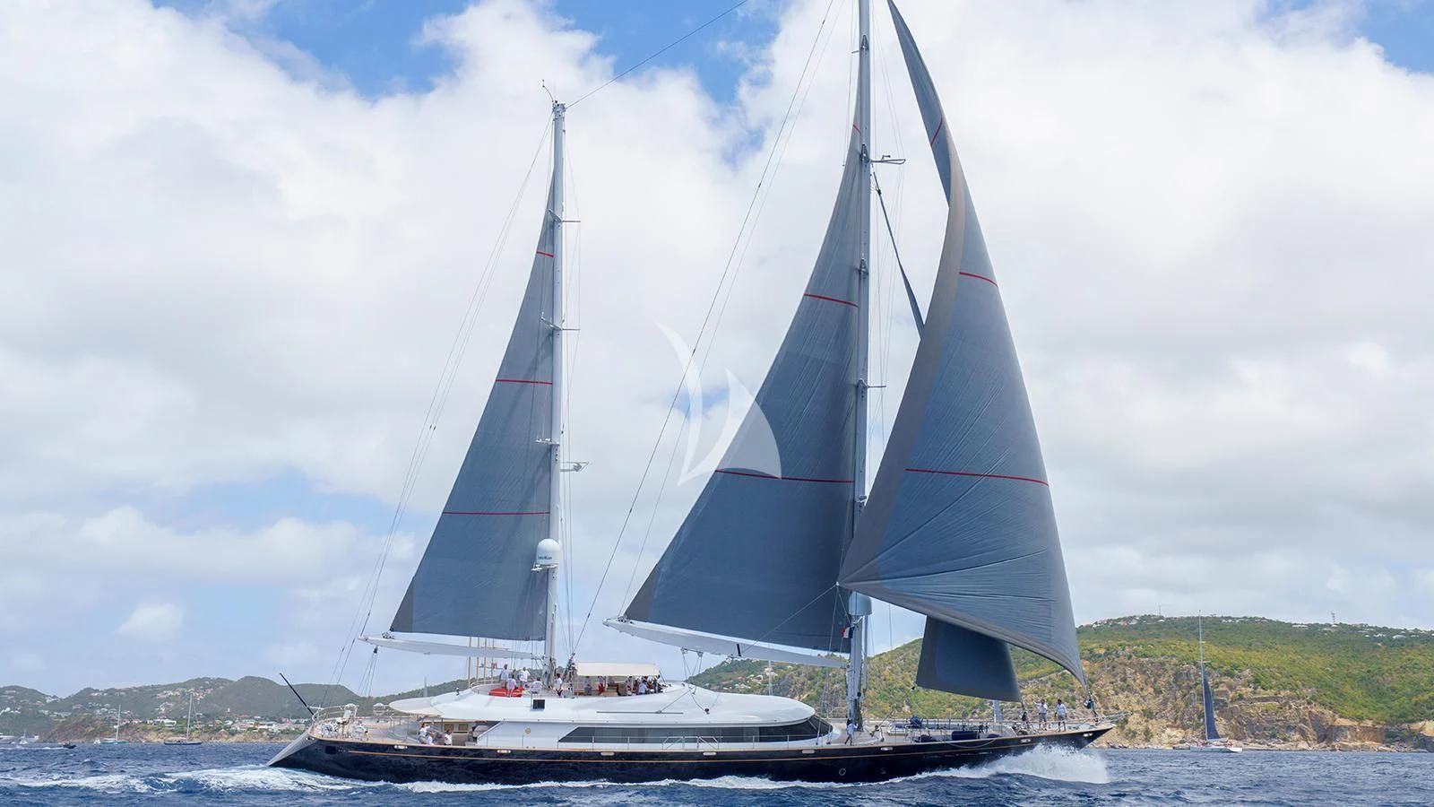 a sailboat on a dock aboard ALMYRA II Yacht for Charter