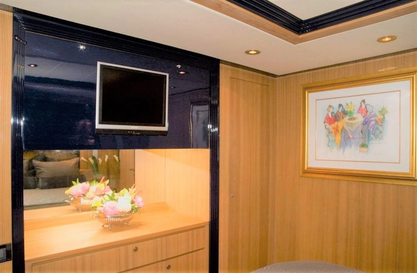 a tv on a wall aboard BON VIVANT Yacht for Sale
