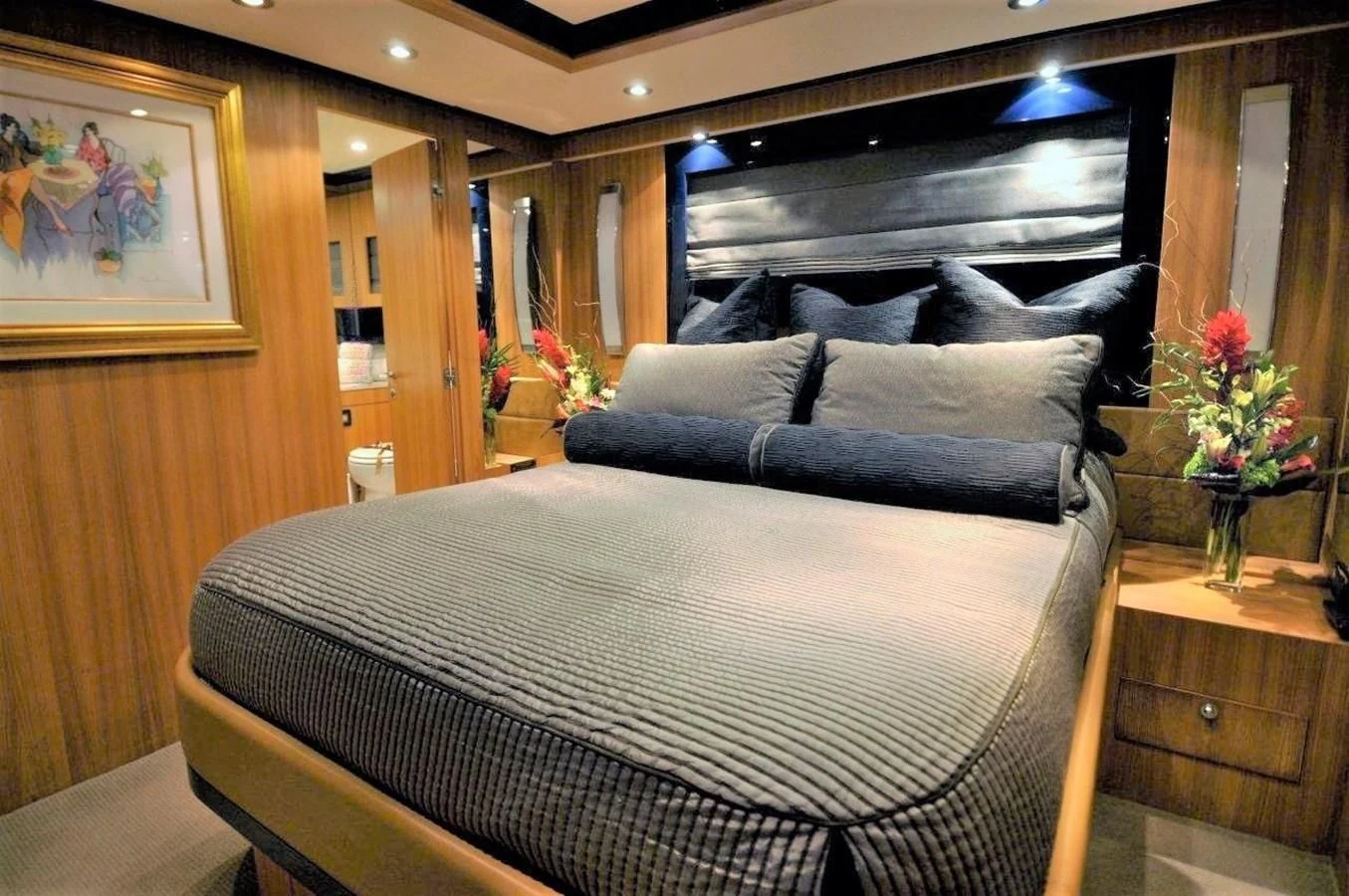 a bed in a room aboard BON VIVANT Yacht for Sale