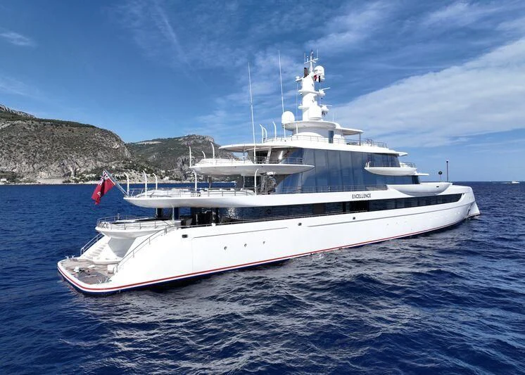 a white yacht on the water aboard EXCELLENCE Yacht for Sale