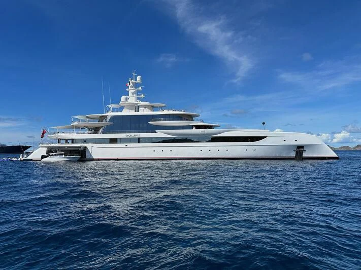 a large white ship in the water aboard EXCELLENCE Yacht for Sale