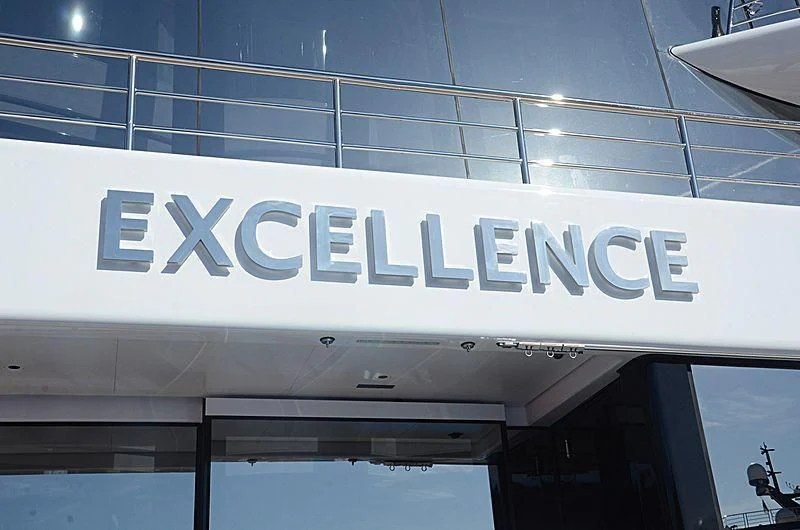a sign on a building aboard EXCELLENCE Yacht for Sale