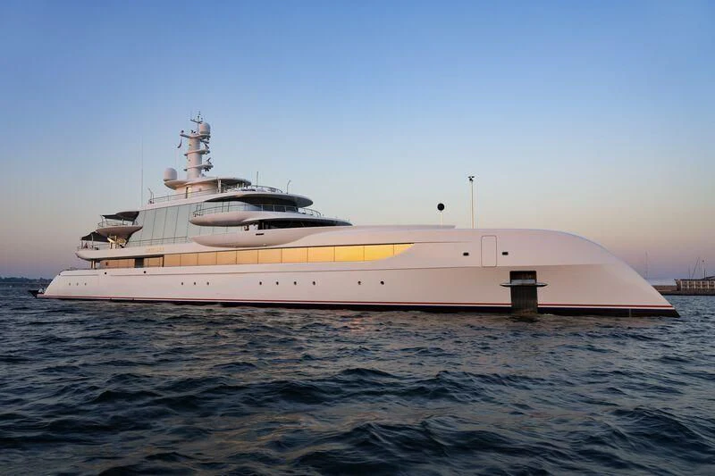 a large white ship in the water aboard EXCELLENCE Yacht for Sale