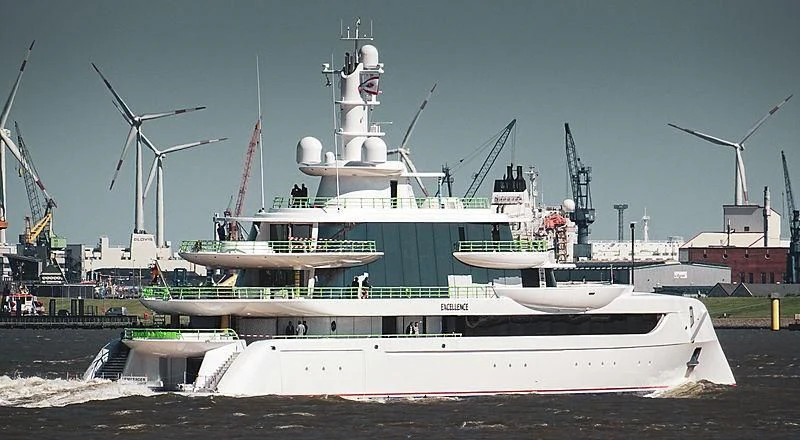 a large ship in a harbor aboard EXCELLENCE Yacht for Sale