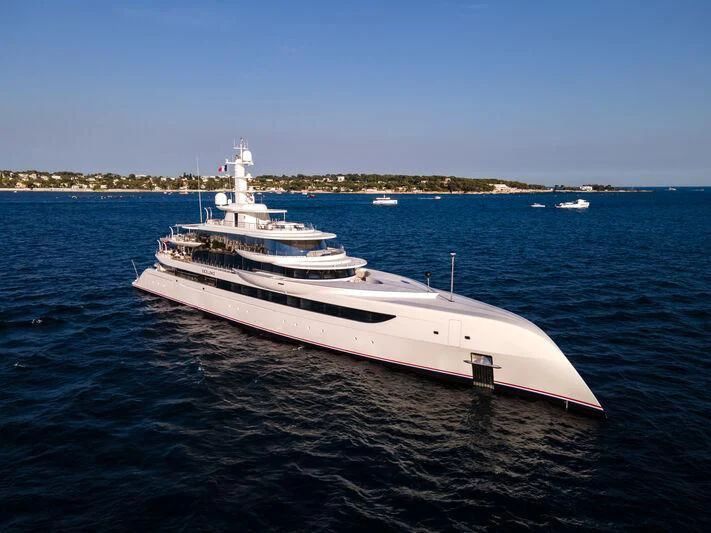 a large white ship in the water aboard EXCELLENCE Yacht for Sale