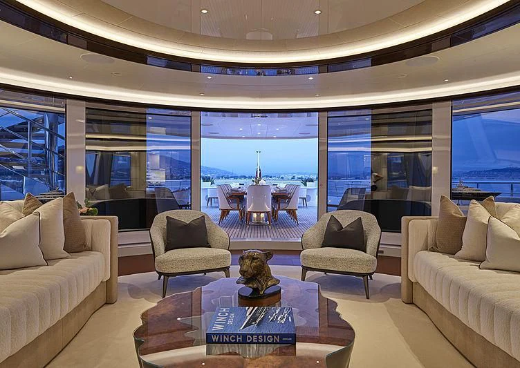 a living room with a large window aboard EXCELLENCE Yacht for Sale