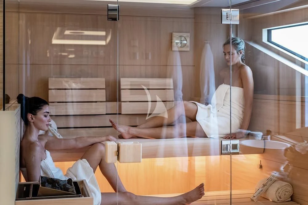 a woman in a room aboard EXCELLENCE Yacht for Sale