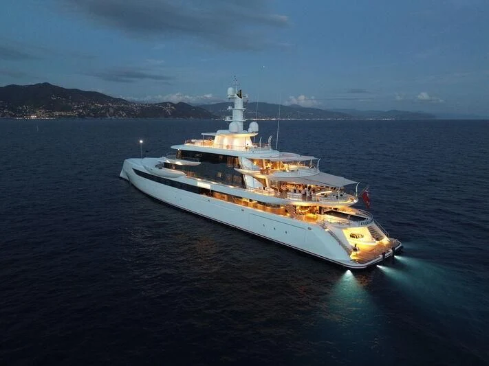 a large ship in the water aboard EXCELLENCE Yacht for Sale