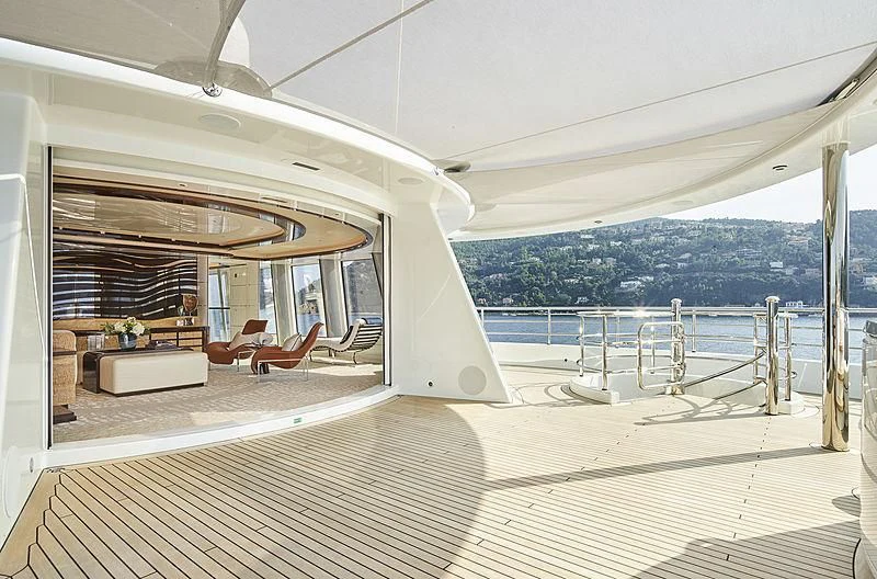 a large white boat on a dock aboard EXCELLENCE Yacht for Sale