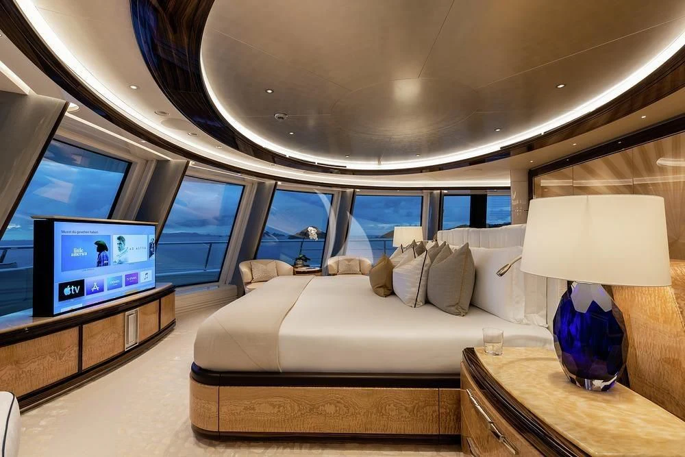 a living room with a large window aboard EXCELLENCE Yacht for Sale