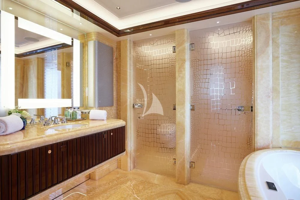 a bathroom with a shower and sink aboard EXCELLENCE Yacht for Sale