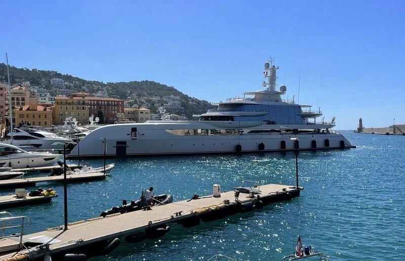 a large ship in the water aboard EXCELLENCE Yacht for Sale