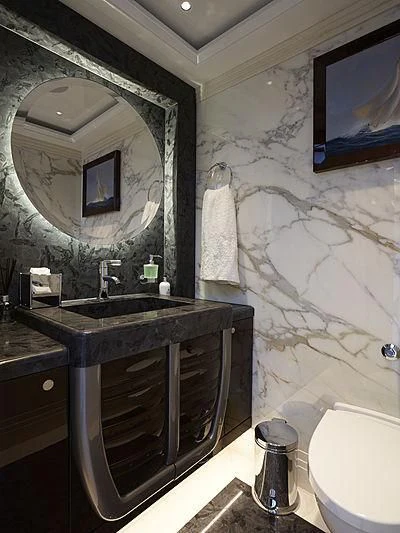 a bathroom with a sink and a mirror aboard EXCELLENCE Yacht for Sale