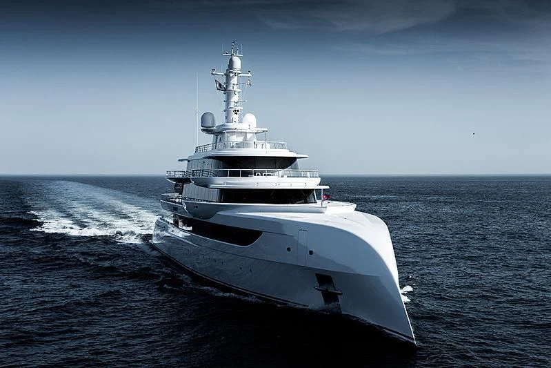 a large white ship in the water aboard EXCELLENCE Yacht for Sale