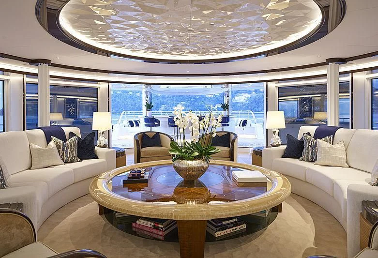 a living room with a large glass ceiling aboard EXCELLENCE Yacht for Sale