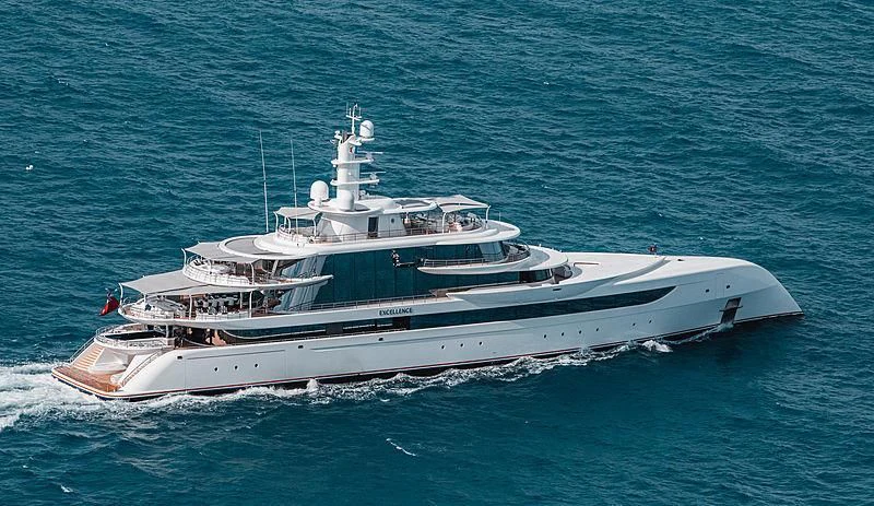 a white boat in the water aboard EXCELLENCE Yacht for Sale