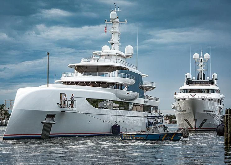 a couple of large white boats aboard EXCELLENCE Yacht for Sale