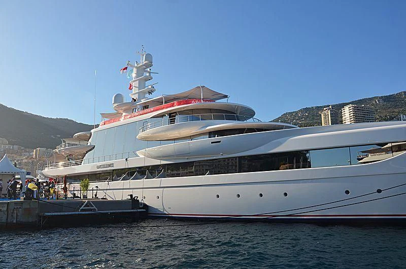 a large white boat aboard EXCELLENCE Yacht for Sale