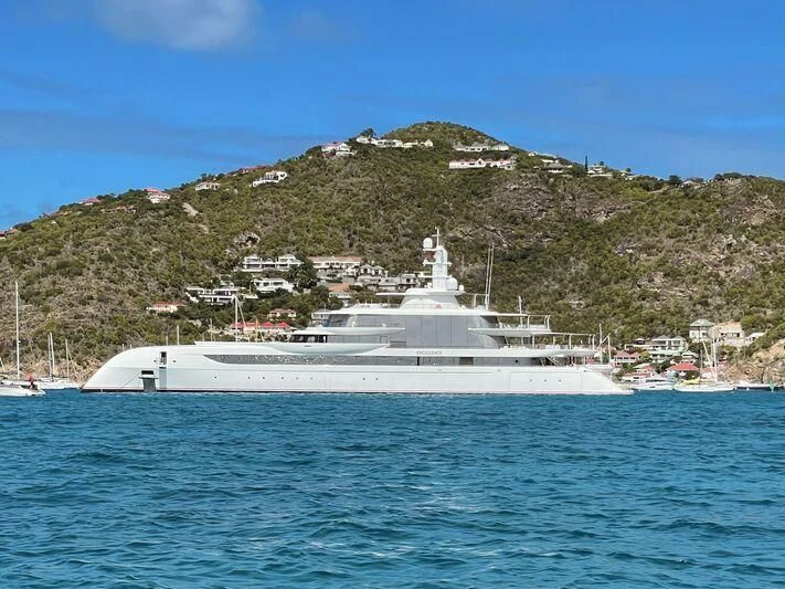 a large white ship in the water aboard EXCELLENCE Yacht for Sale