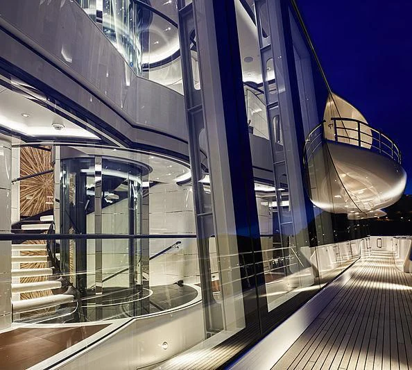 a large glass wall with glass windows aboard EXCELLENCE Yacht for Sale