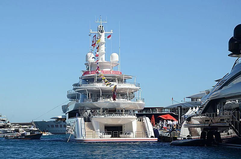 a large ship in the water aboard EXCELLENCE Yacht for Sale