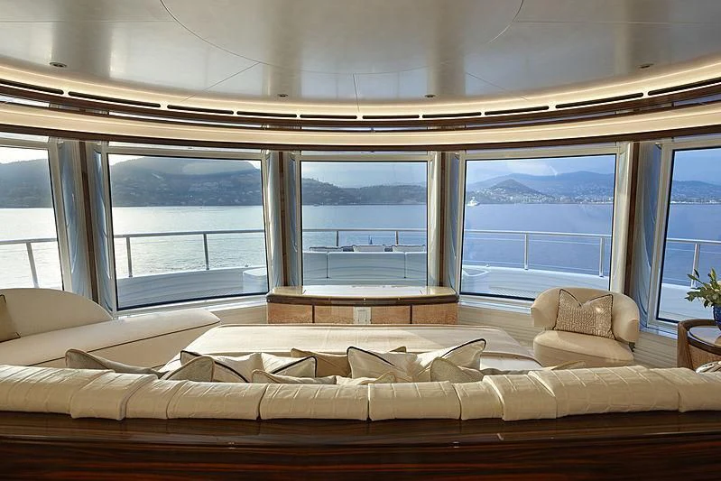 a large bed in a room aboard EXCELLENCE Yacht for Sale
