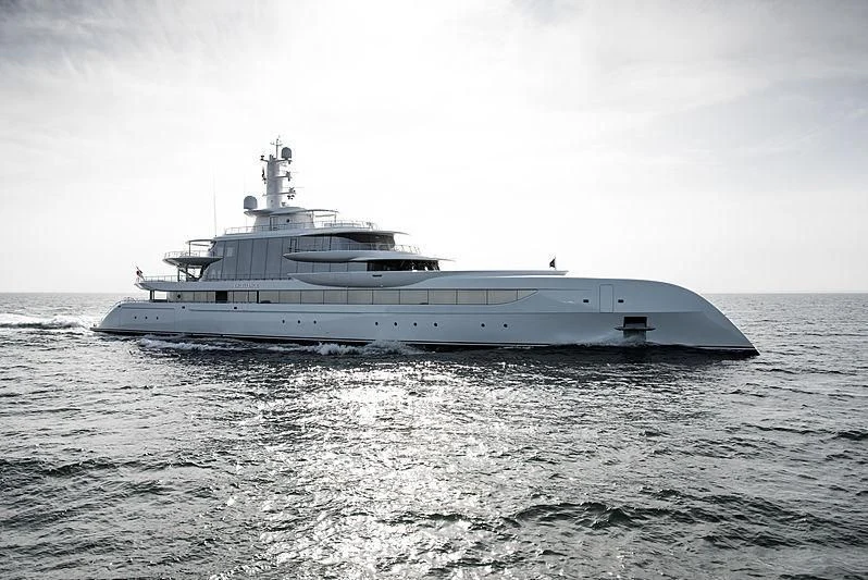a large white boat in the water aboard EXCELLENCE Yacht for Sale