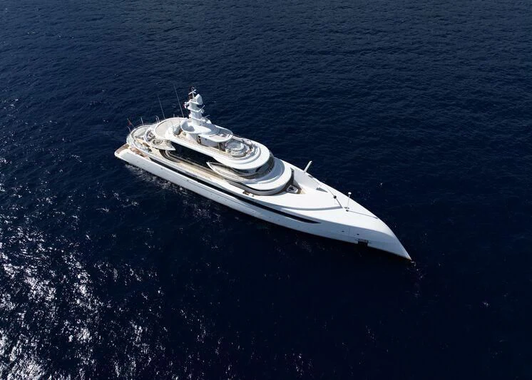 a white boat in the water aboard EXCELLENCE Yacht for Sale
