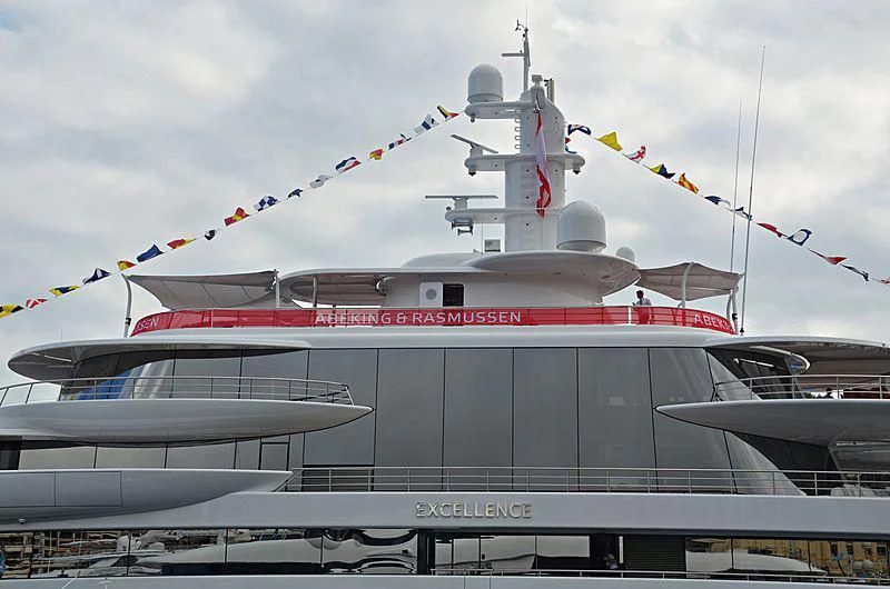 a large boat with kites flying over it aboard EXCELLENCE Yacht for Sale