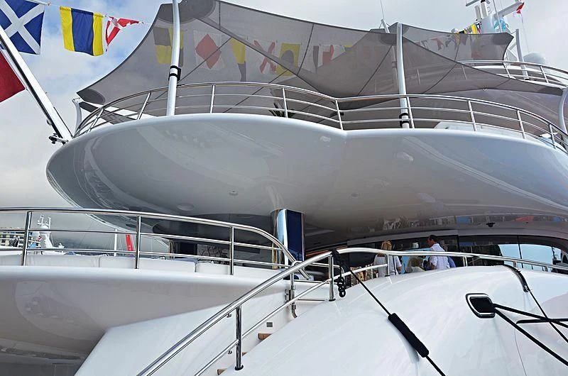 a large silver ship aboard EXCELLENCE Yacht for Sale