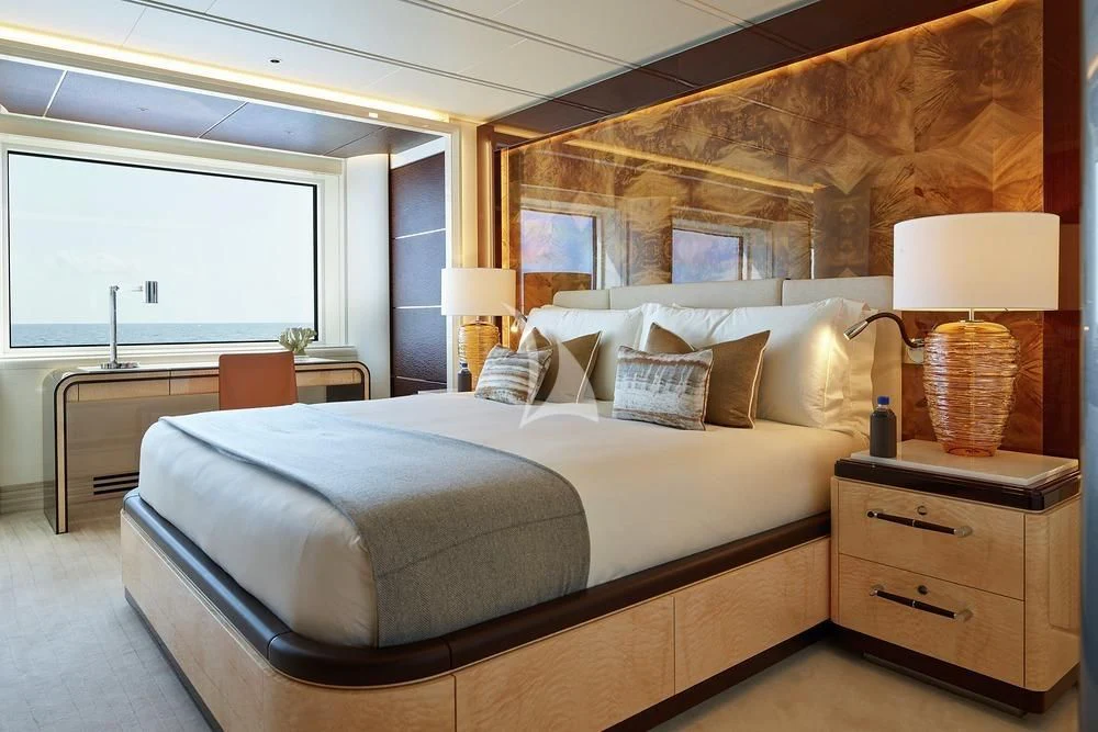 a bed with a large bed aboard EXCELLENCE Yacht for Sale
