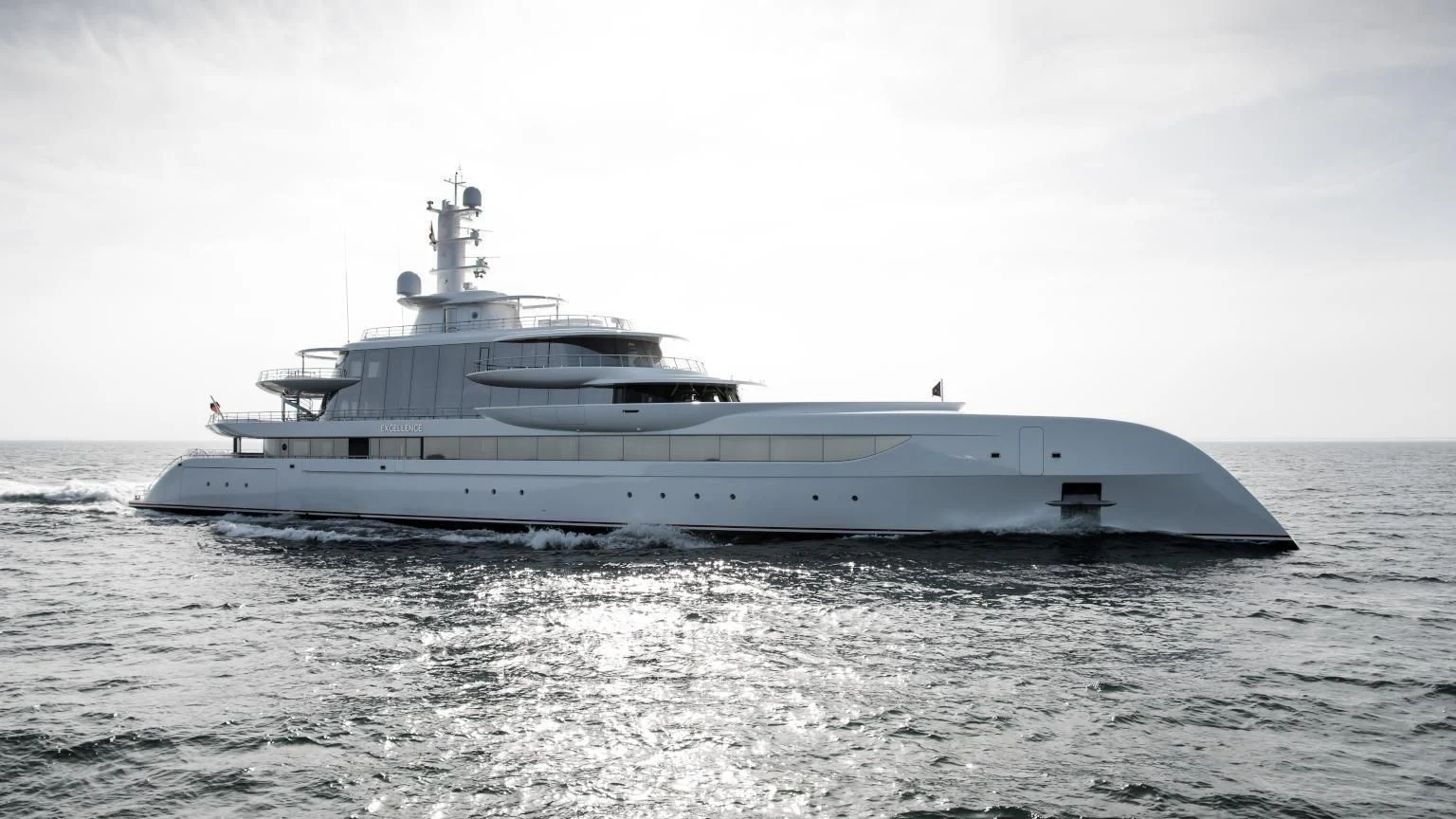 a large white ship in the water aboard EXCELLENCE Yacht for Sale
