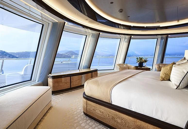 a room with a bed and a window aboard EXCELLENCE Yacht for Sale
