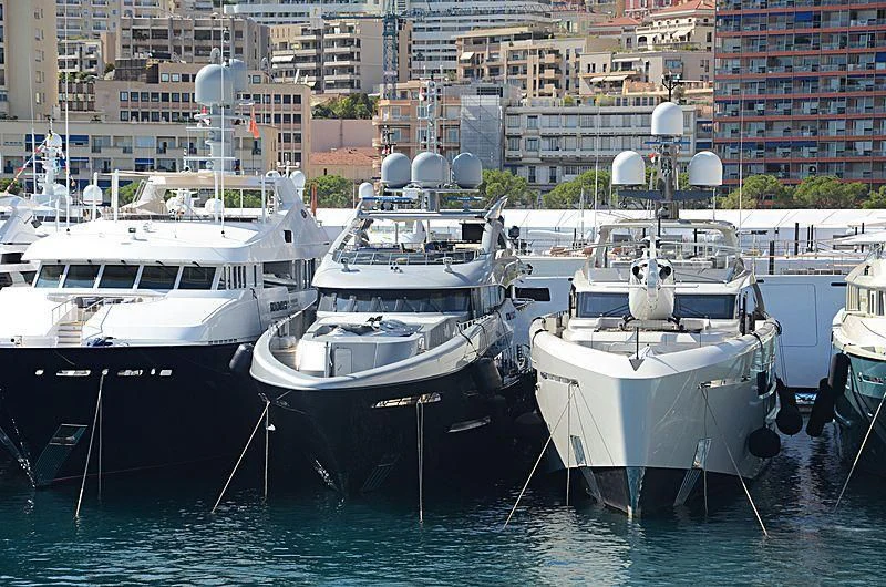 several boats are parked in a harbor aboard SILY Yacht for Sale