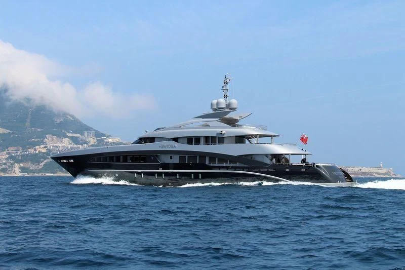 a large ship in the water aboard SILY Yacht for Sale