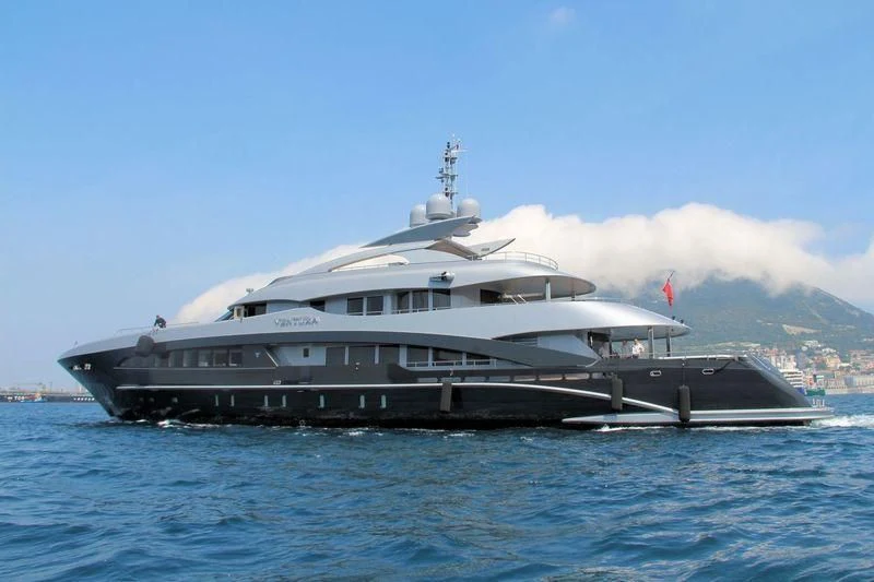 a large boat on the water aboard SILY Yacht for Sale