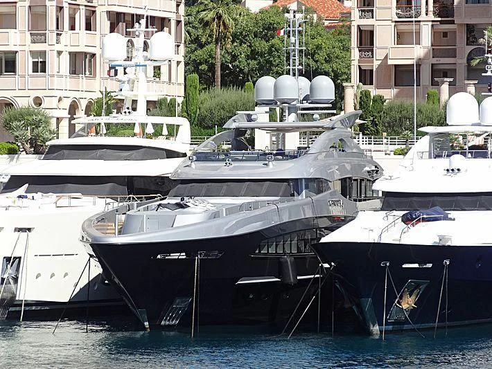 a group of boats are parked in a harbor aboard SILY Yacht for Sale