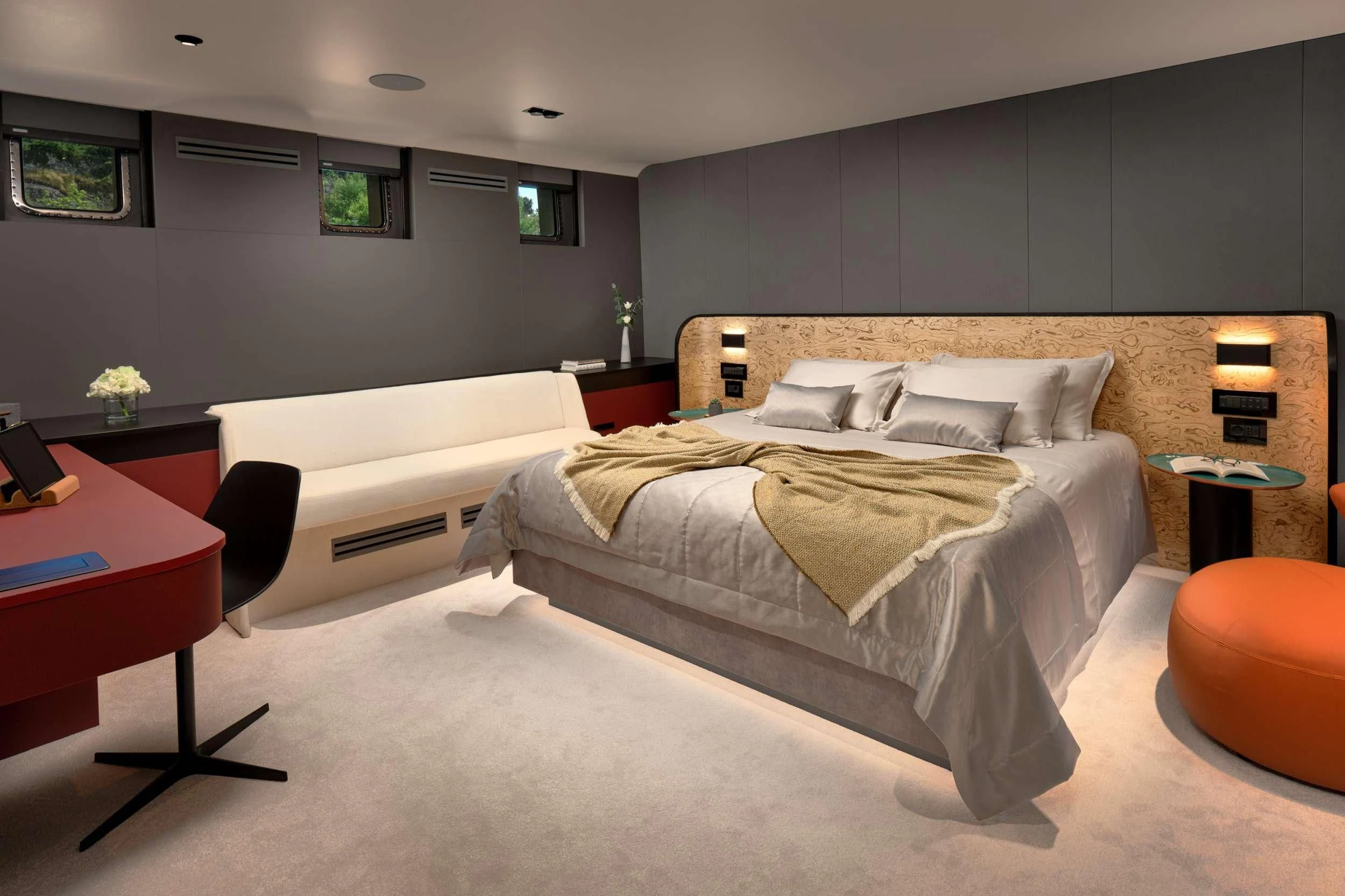 a room with a bed and a table aboard ANETTA Yacht for Charter