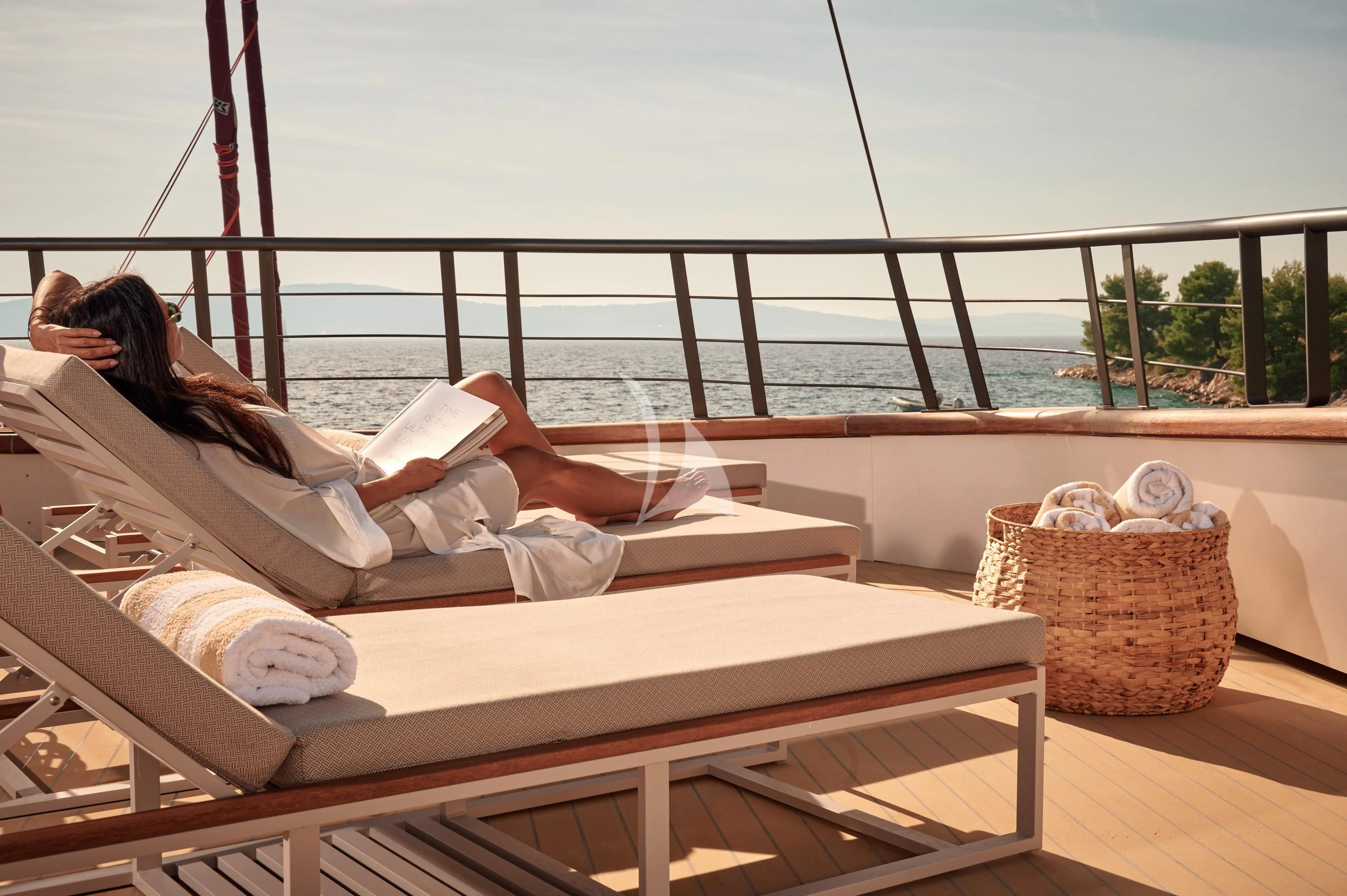 a person lying on a bed aboard ANETTA Yacht for Charter