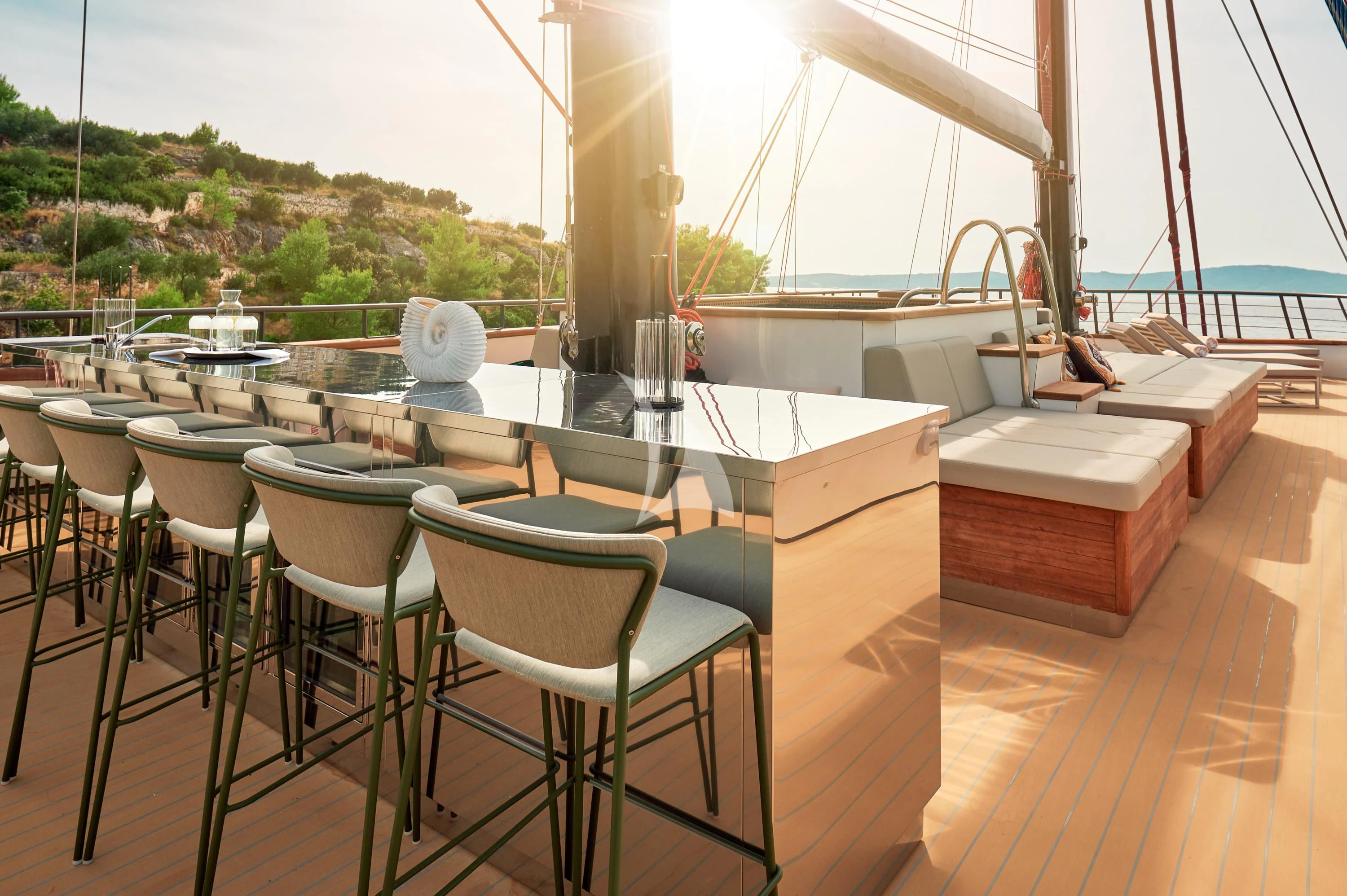 a table with chairs on it aboard ANETTA Yacht for Charter