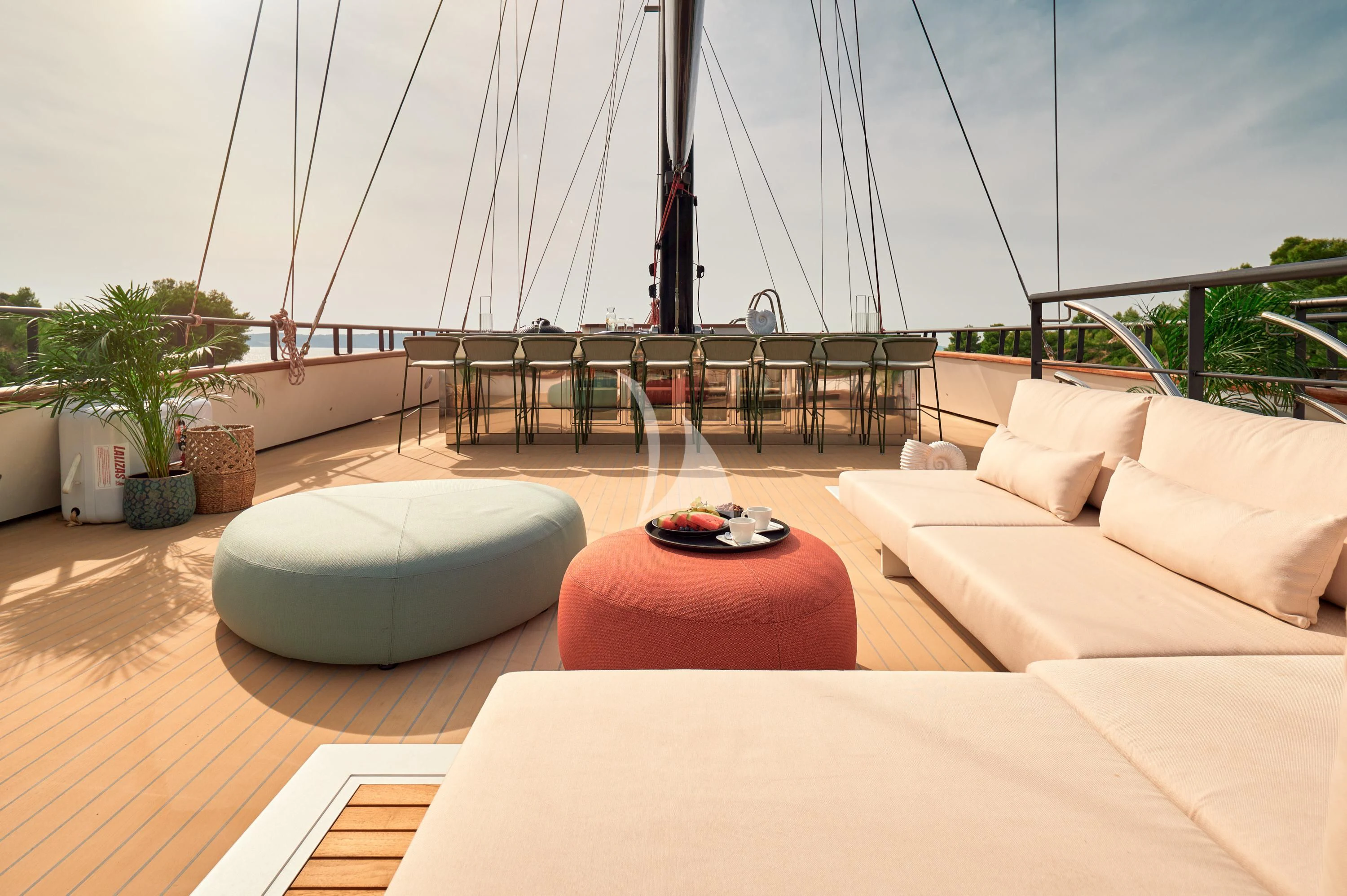 a patio with a couch and a table on it aboard ANETTA Yacht for Charter