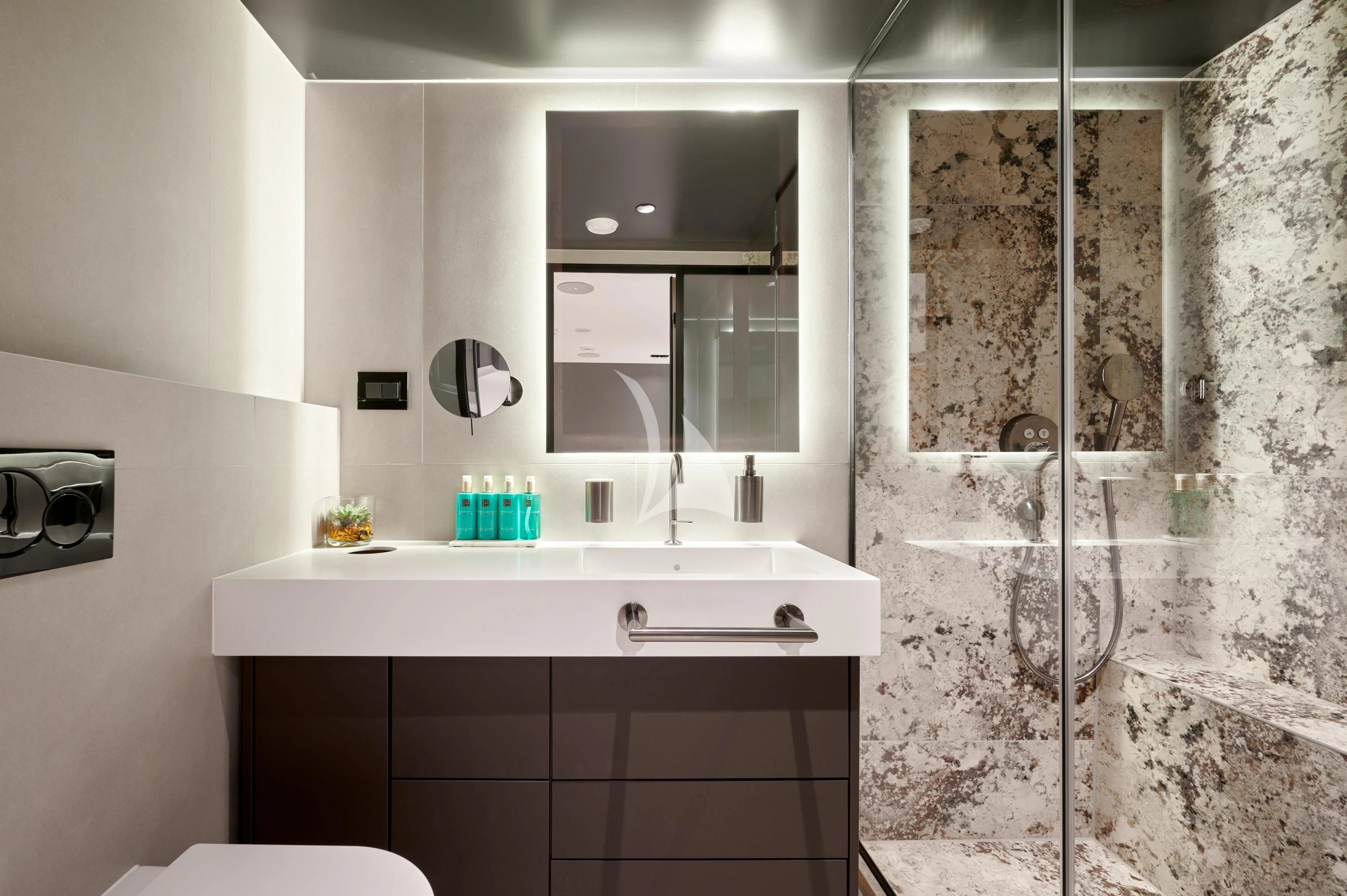 a bathroom with a sink and a mirror aboard ANETTA Yacht for Charter