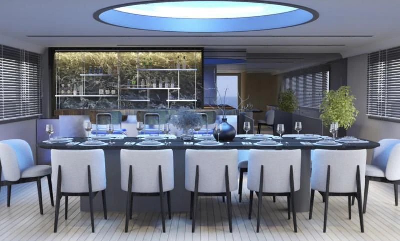 a large kitchen with a table and chairs aboard ANETTA Yacht for Charter