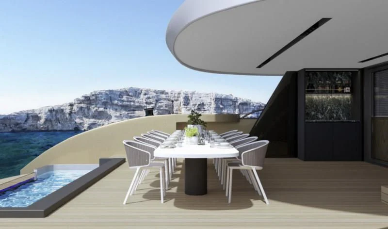 a table and chairs on a patio aboard ANETTA Yacht for Charter