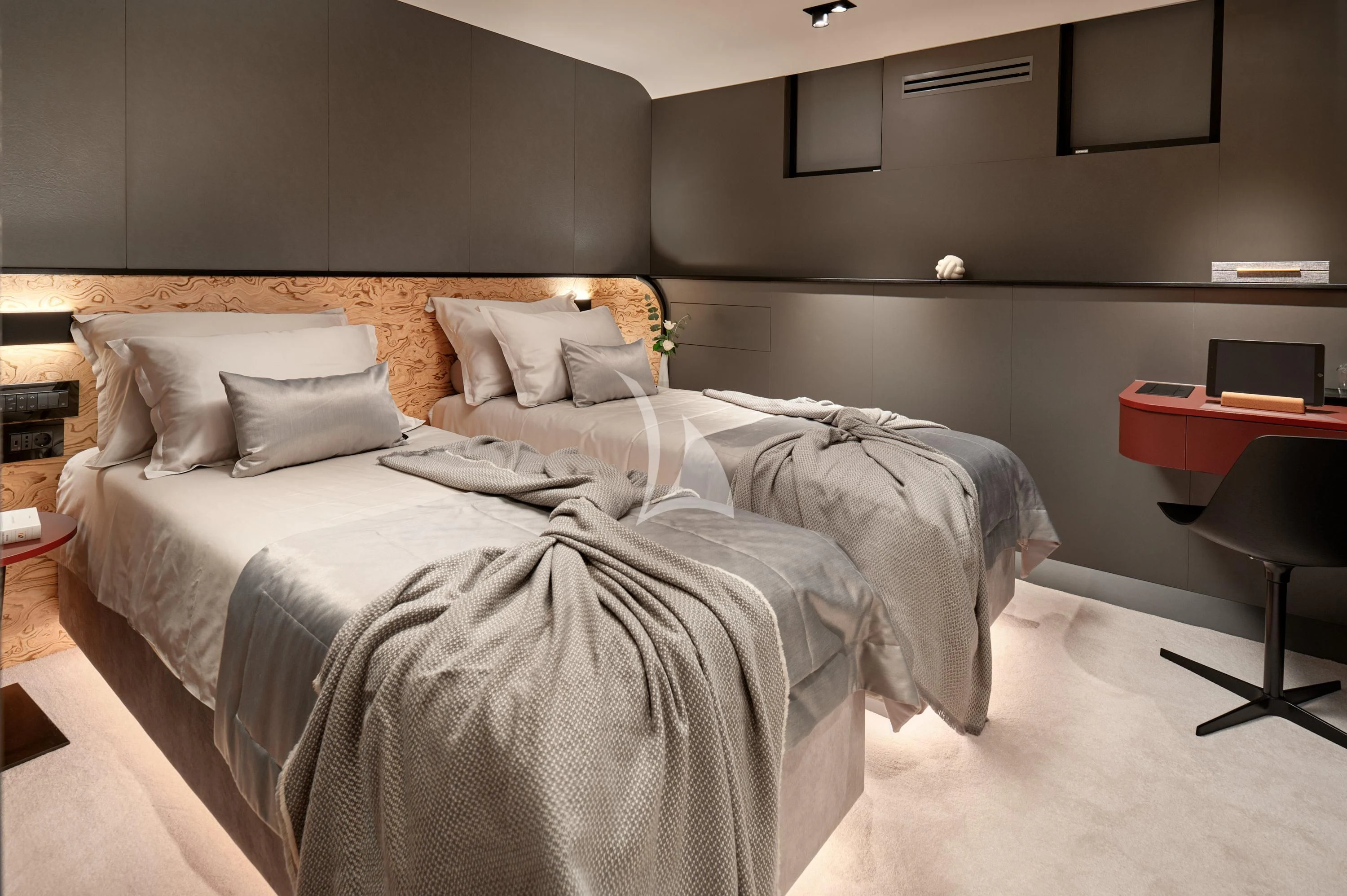 a room with a bed and a desk aboard ANETTA Yacht for Charter